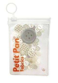 Assorted white treasure buttons